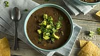Fresh Homemade Black Bean Soup with Avocado and Cilantro