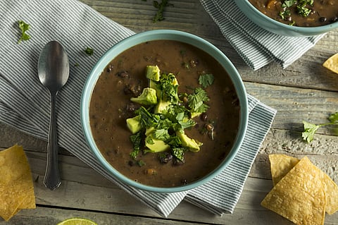 Fresh Homemade Black Bean Soup with Avocado and Cilantro