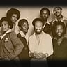 Earth, Wind, & Fire c. 1977. Front, from left: Verdine White, Al McKay, Philip Bailey, Maurice White, Andrew Woolfolk, Ralph Johnson. Back, from left: Larry Dunn, Fred White, Johnny Graham.