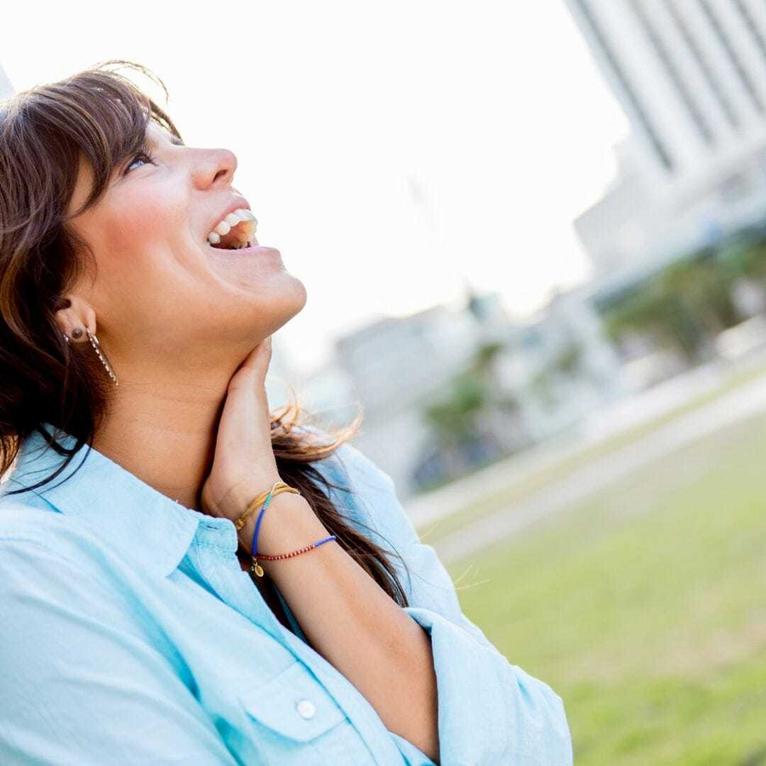 woman smiling - chocolate makes you happy